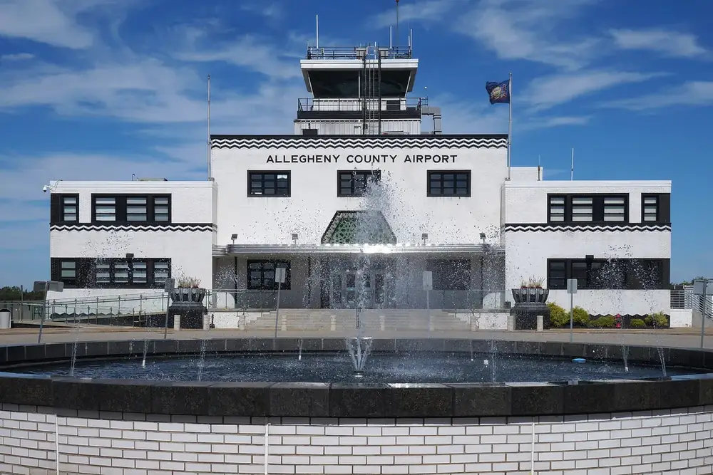 Art Deco Allegheny County Airport terminal with a fountain in front in West Mifflin, Pennsylvania